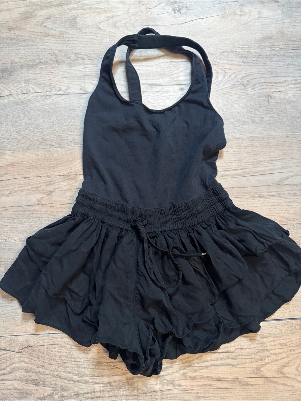 Free People Movement Prima Tiered Shortsie Romper in Black sz XS